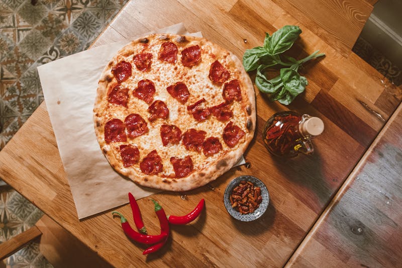 Garden vegetable pizza topped with fresh produce