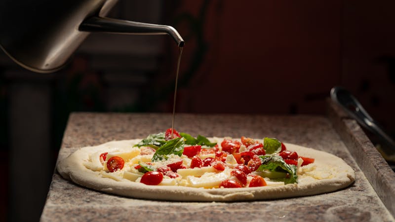 Punch pizza signature pie fresh from the wood-fired oven